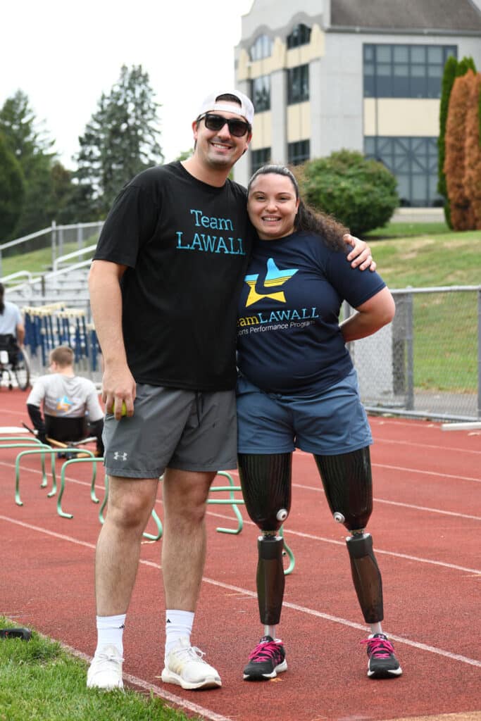 Prosthetist with patient at event