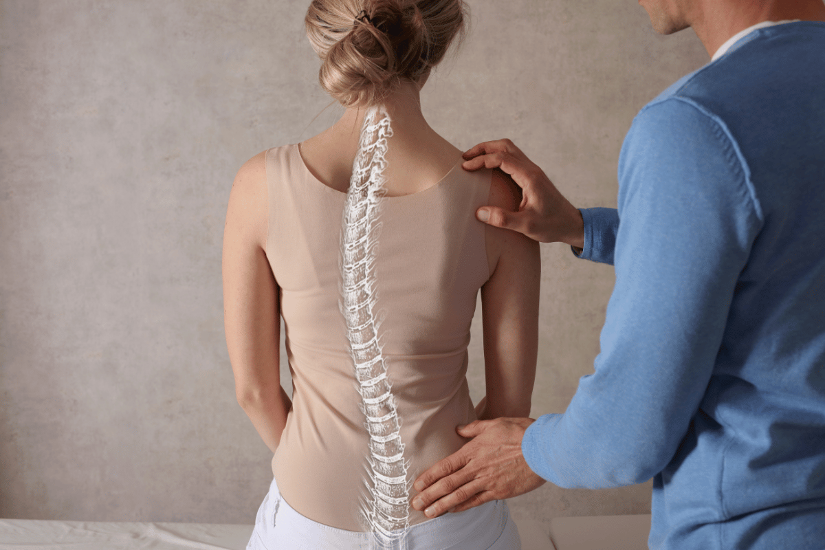 Woman getting an exam for Scoliosis