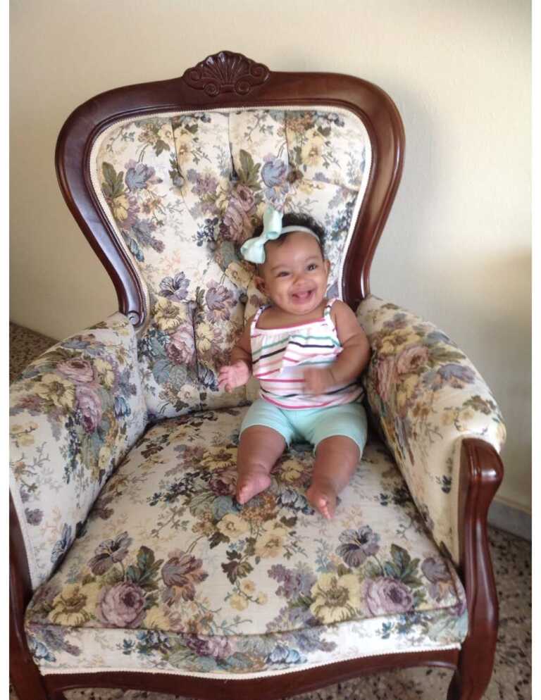 Baby sitting in chair