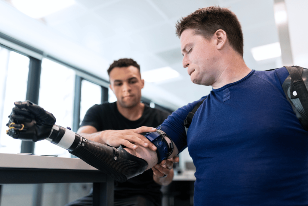 man with a prosthetic arm in therapy